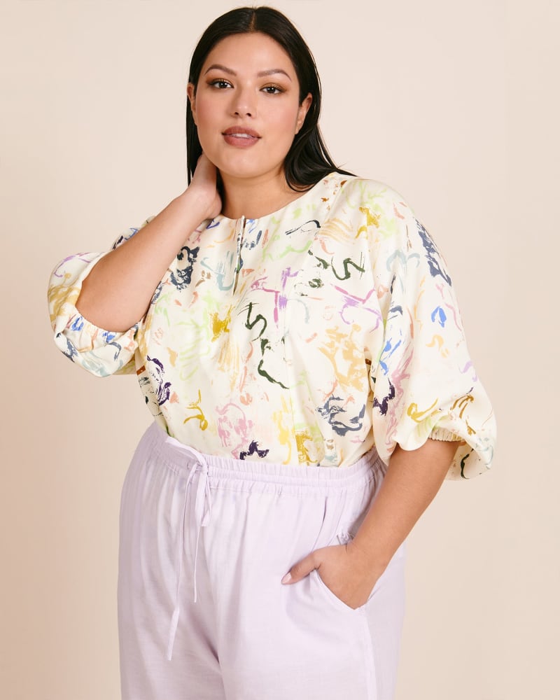 Front of a model wearing a size 16 Bequia Top in Brushstrokes Floral by Apiece Apart. | dia_product_style_image_id:231071